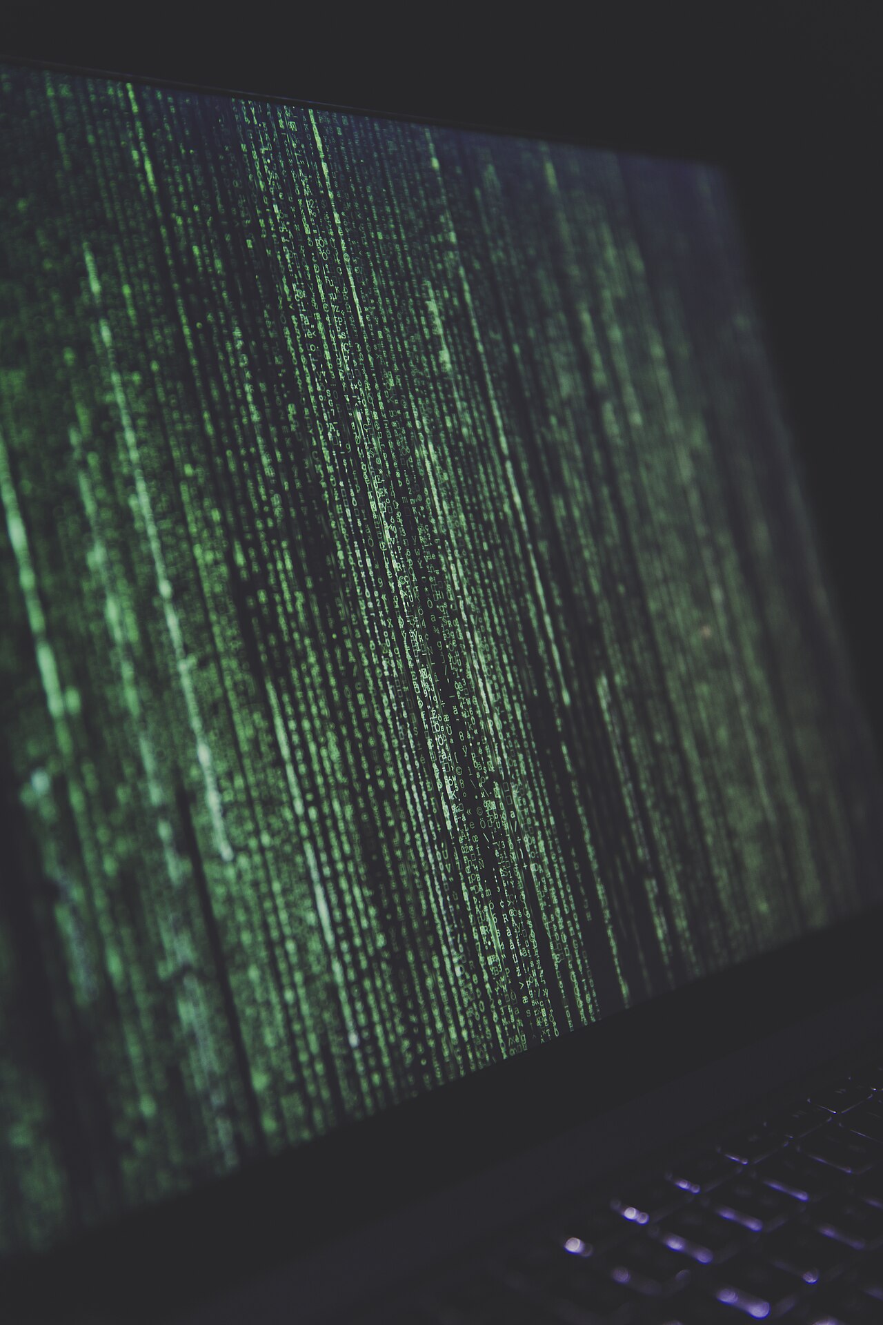 Green Matrix rain on a screen (Unsplash)